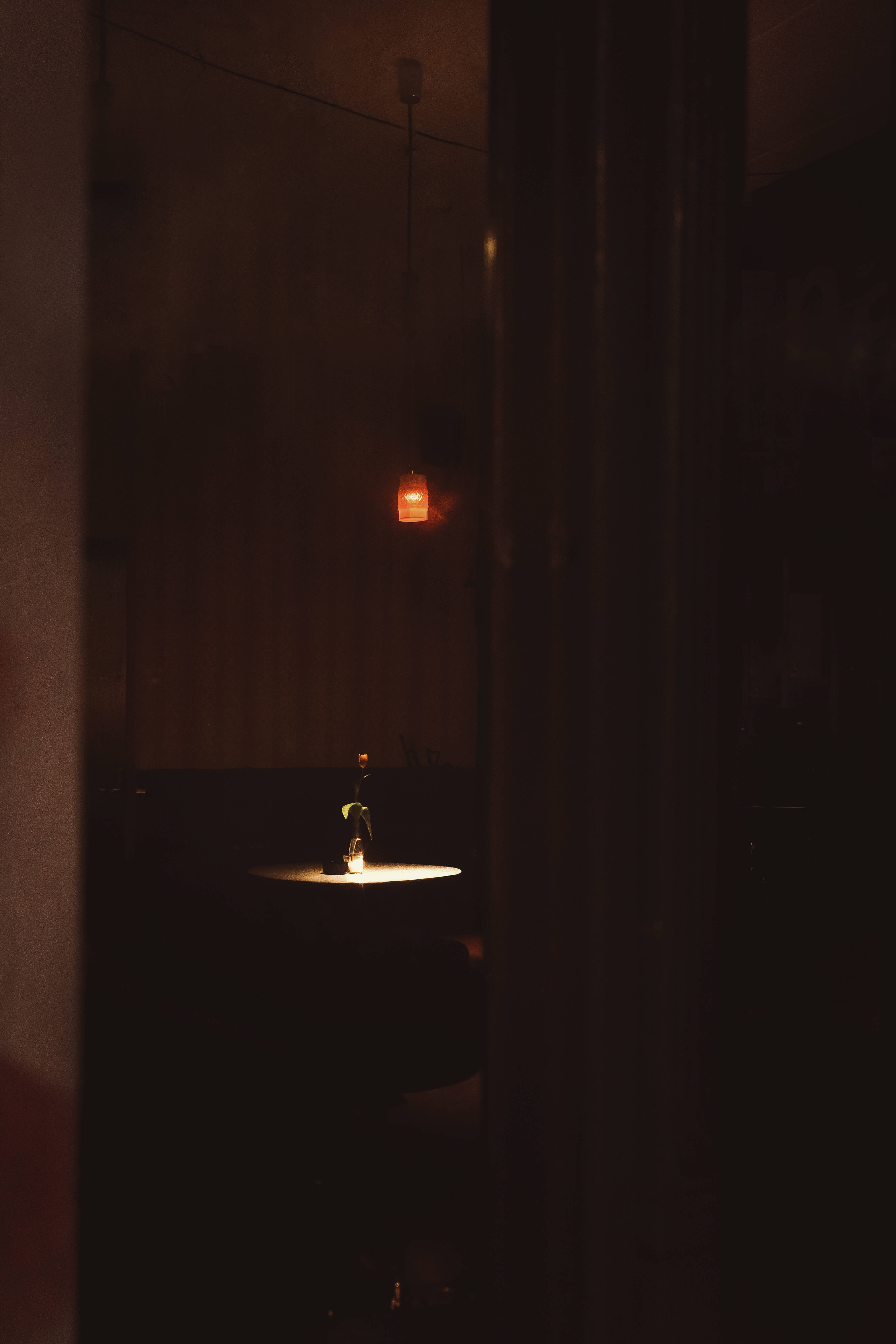 Low key image of a table in a bar