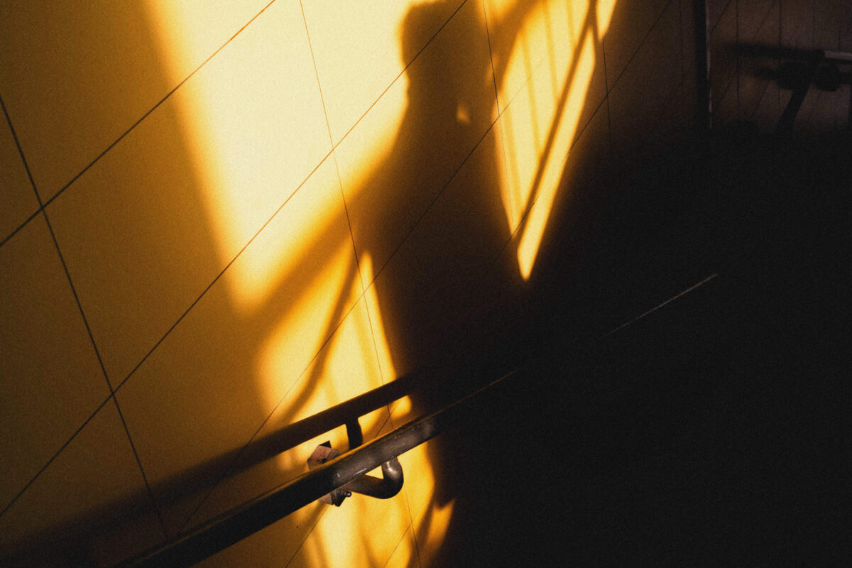 Staged Photography VS Candid Photography. Which one is best for you? Fedor Vasilev Photographer In Berlin candid street photograph of a shadow in berlin
