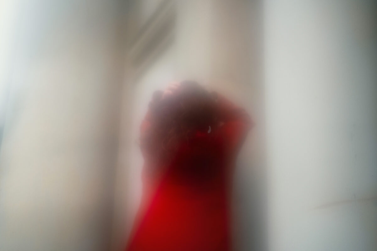 Blurred picture of a young woman on a street  of Berlin