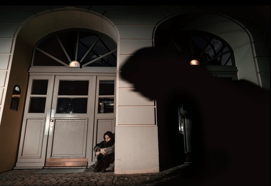 10 Best Ways To Improve Photography Skills. Fedor Vasilev Photographer In Berlin Woman sitting on a street in Berlin at night