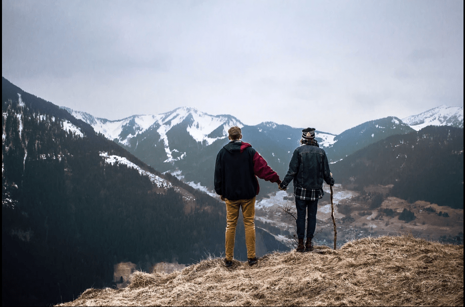 10 Best Ways To Improve Photography Skills. Fedor Vasilev Photographer In Berlin Photographer Fedor Vasilev and Anna Ivahnenko are standing on a mountain