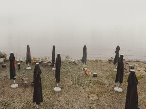 take photos with a phone: a shot of umbrellas on a shore