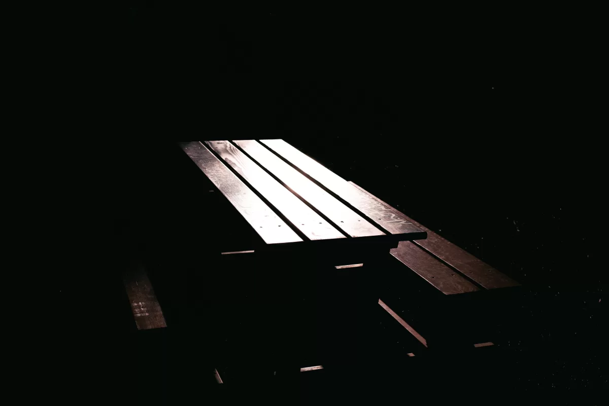 Using single focal length. Prime Lenses. Fedor Vasilev Photographer In Berlin a table in the darkness. Fine art photo in Vienna