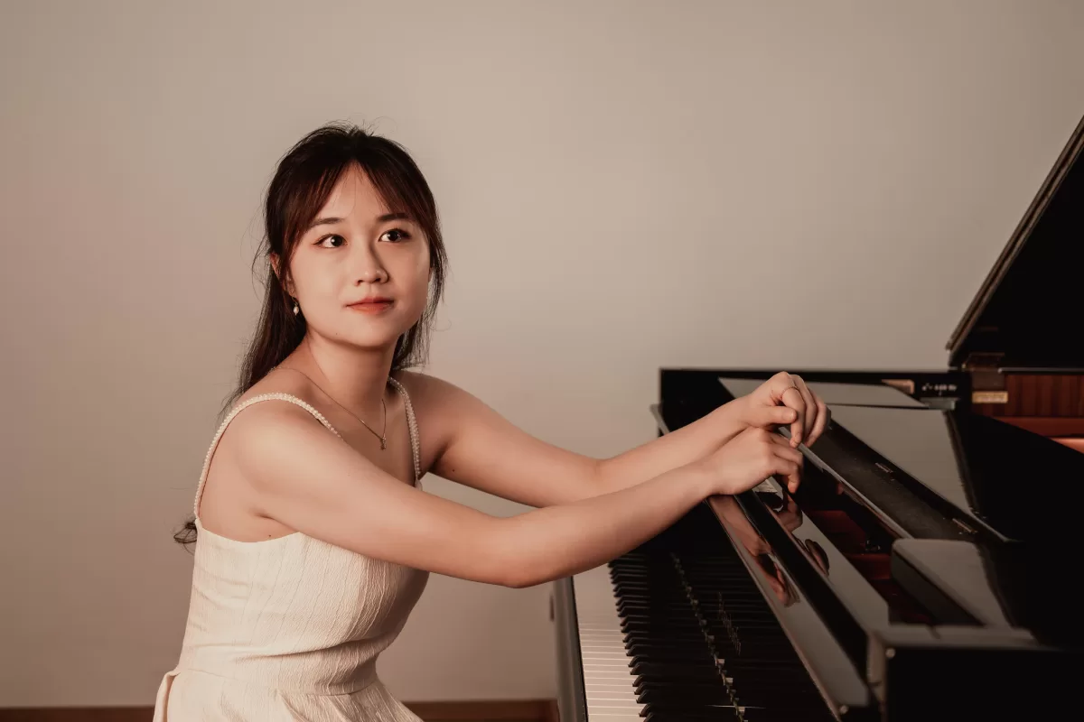 A pianist getting ready to play