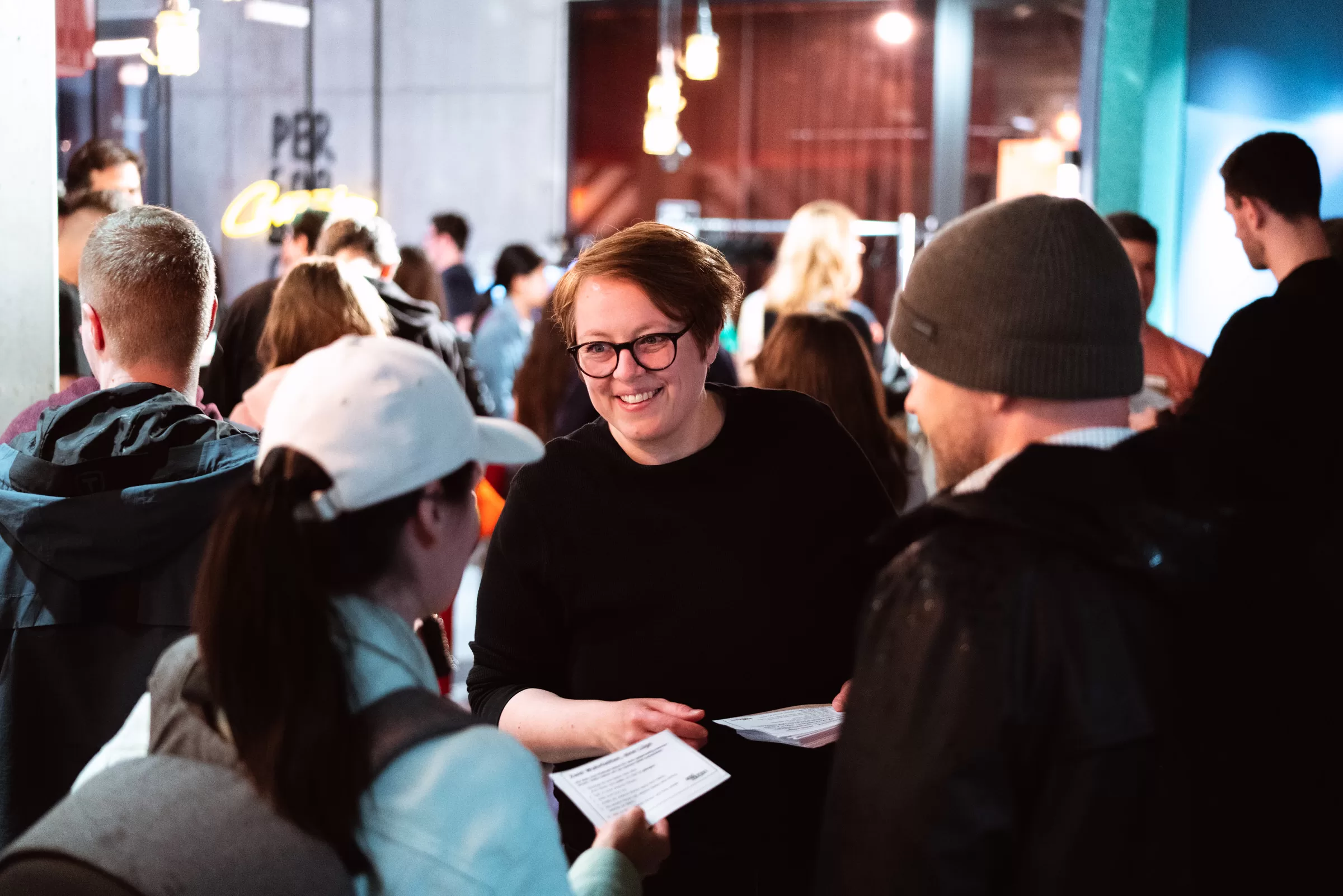 People chatting on an event reception, event photoshoot in Vienna by Fedor Vasilev