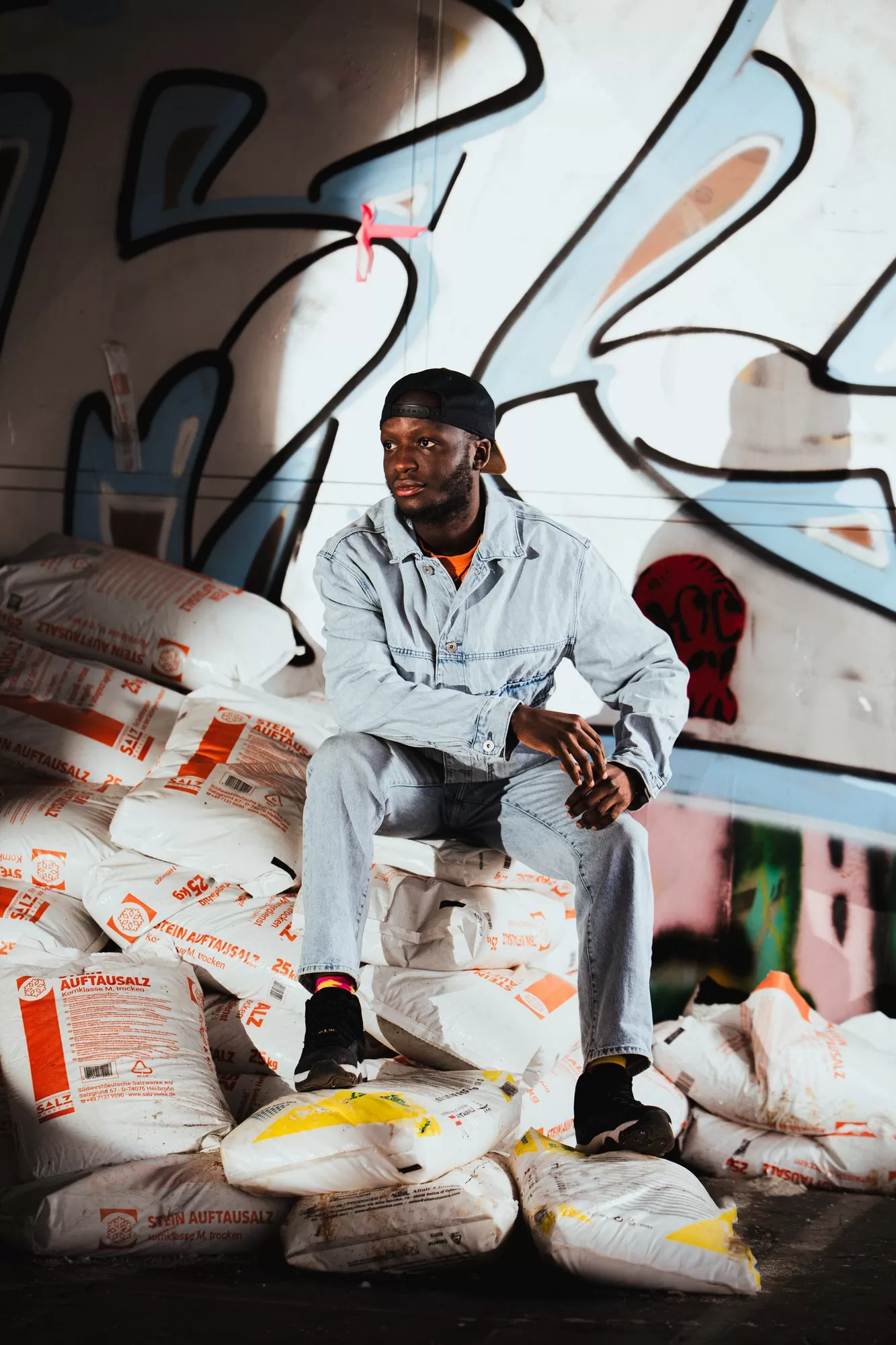Dramatic creative portrait photoshoot in Vienna: a portrait of a man in an abandoned area