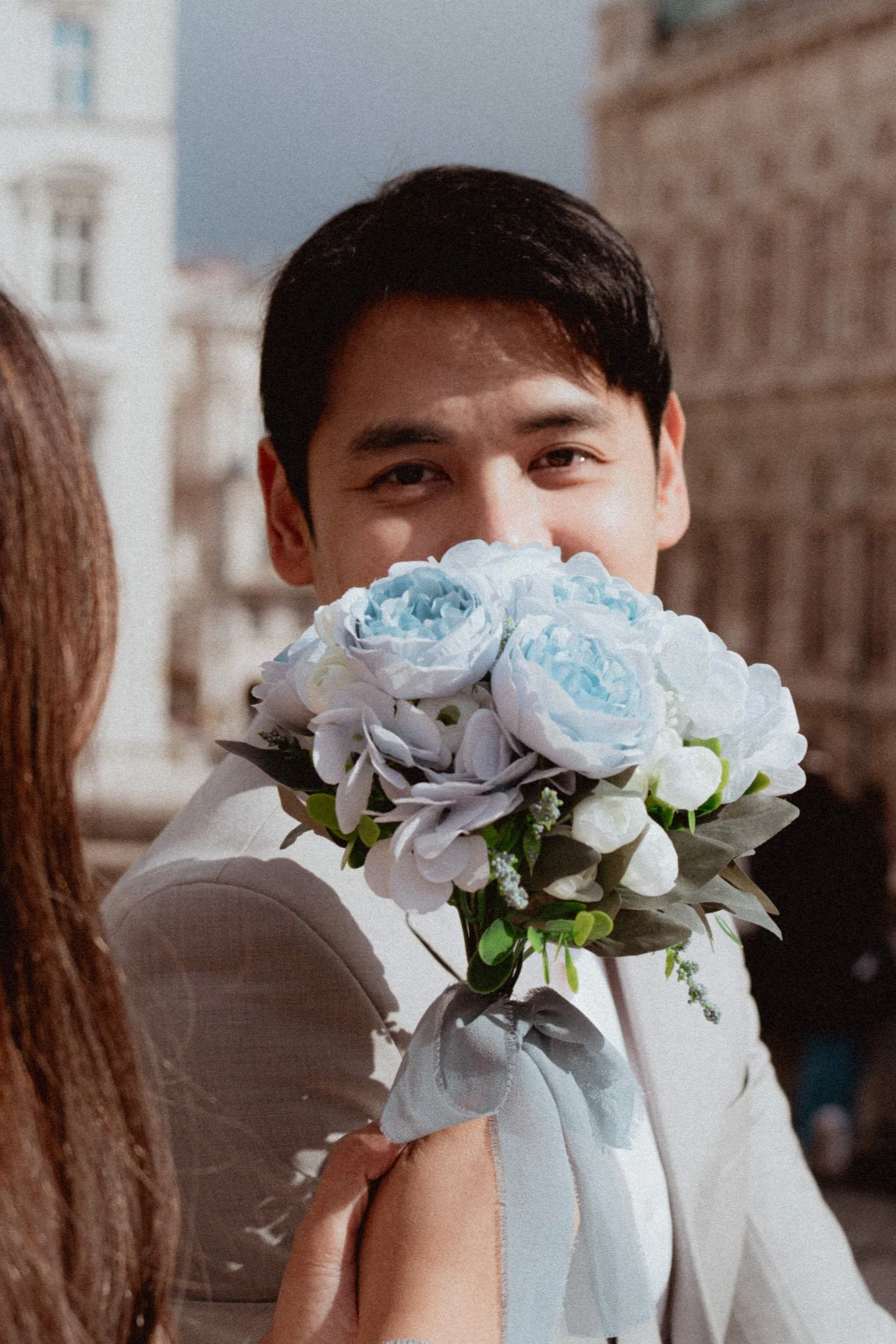 Portrait of a groom at Albertina terrace during their elopement