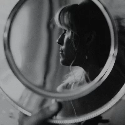 Black and white storytelling portrait of a bride