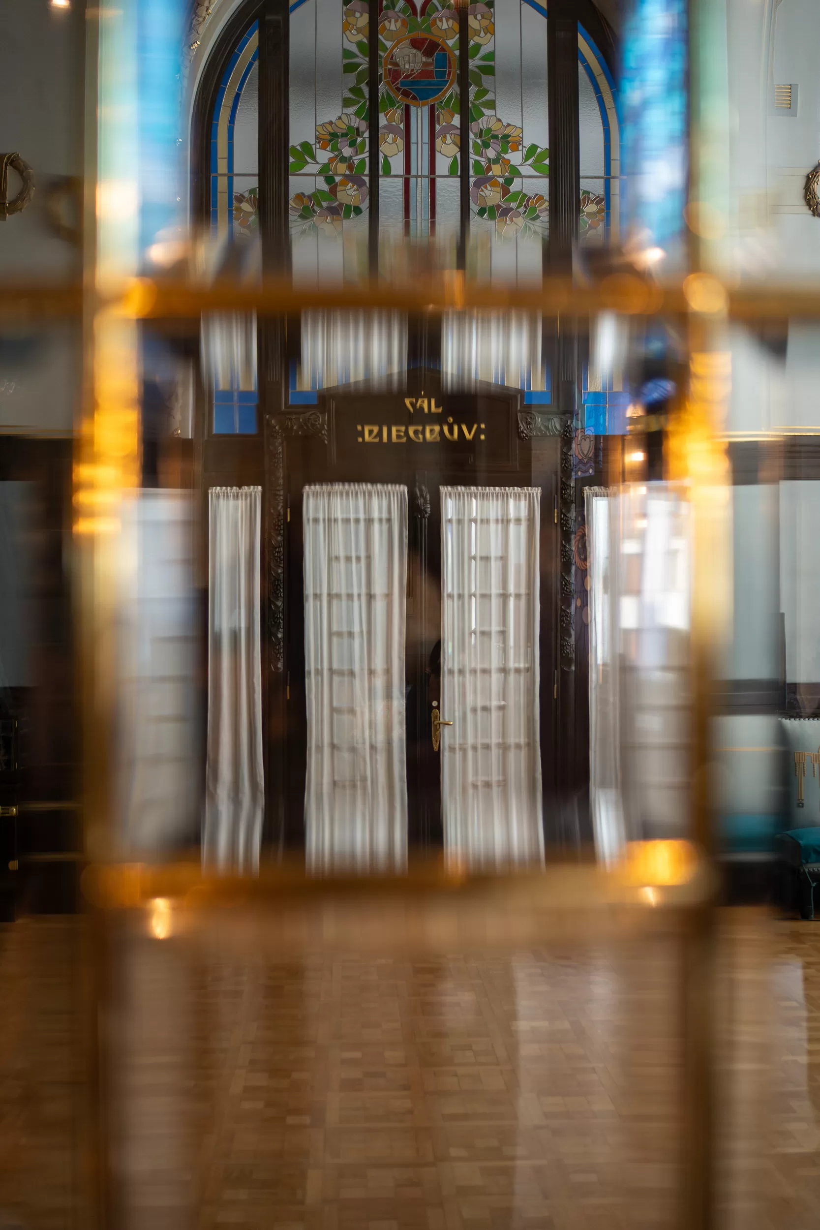 Abstract photo with interiors of an old concert house with stained glass