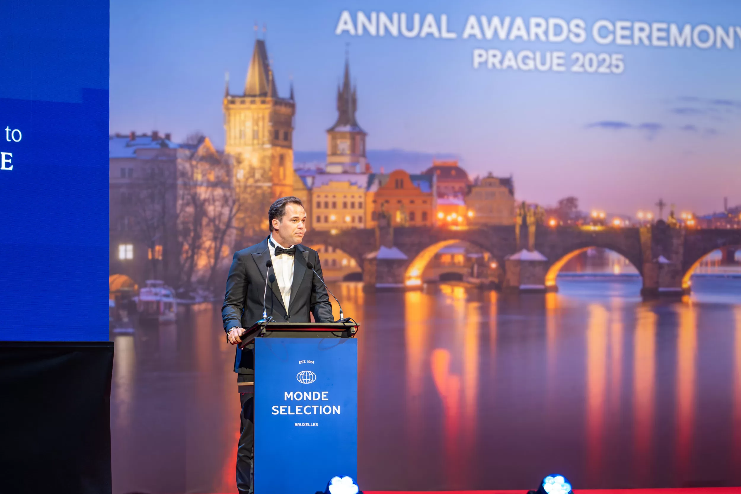 an event speaker opening an award ceremony