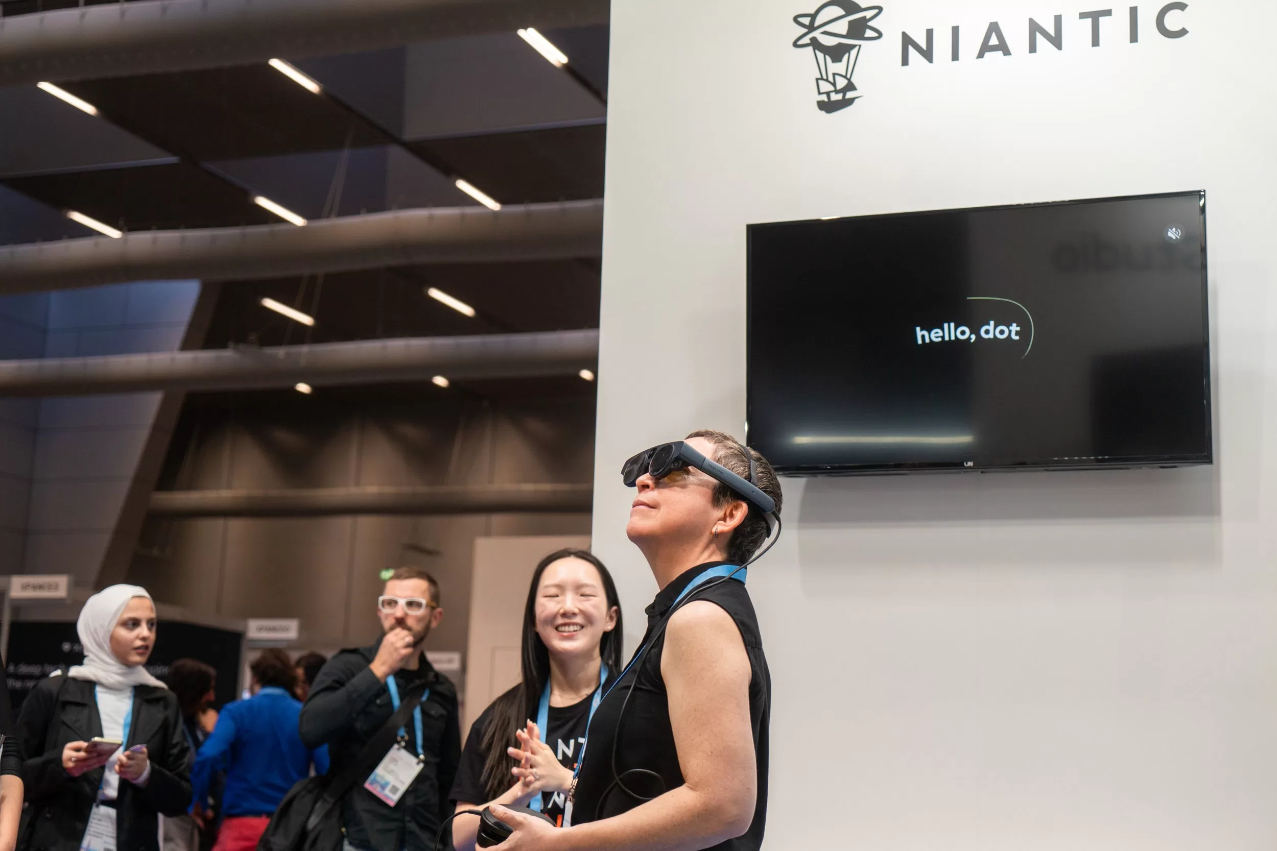 A person in ar glasses at a tech exhibition, by event photographer fedor vasilev 