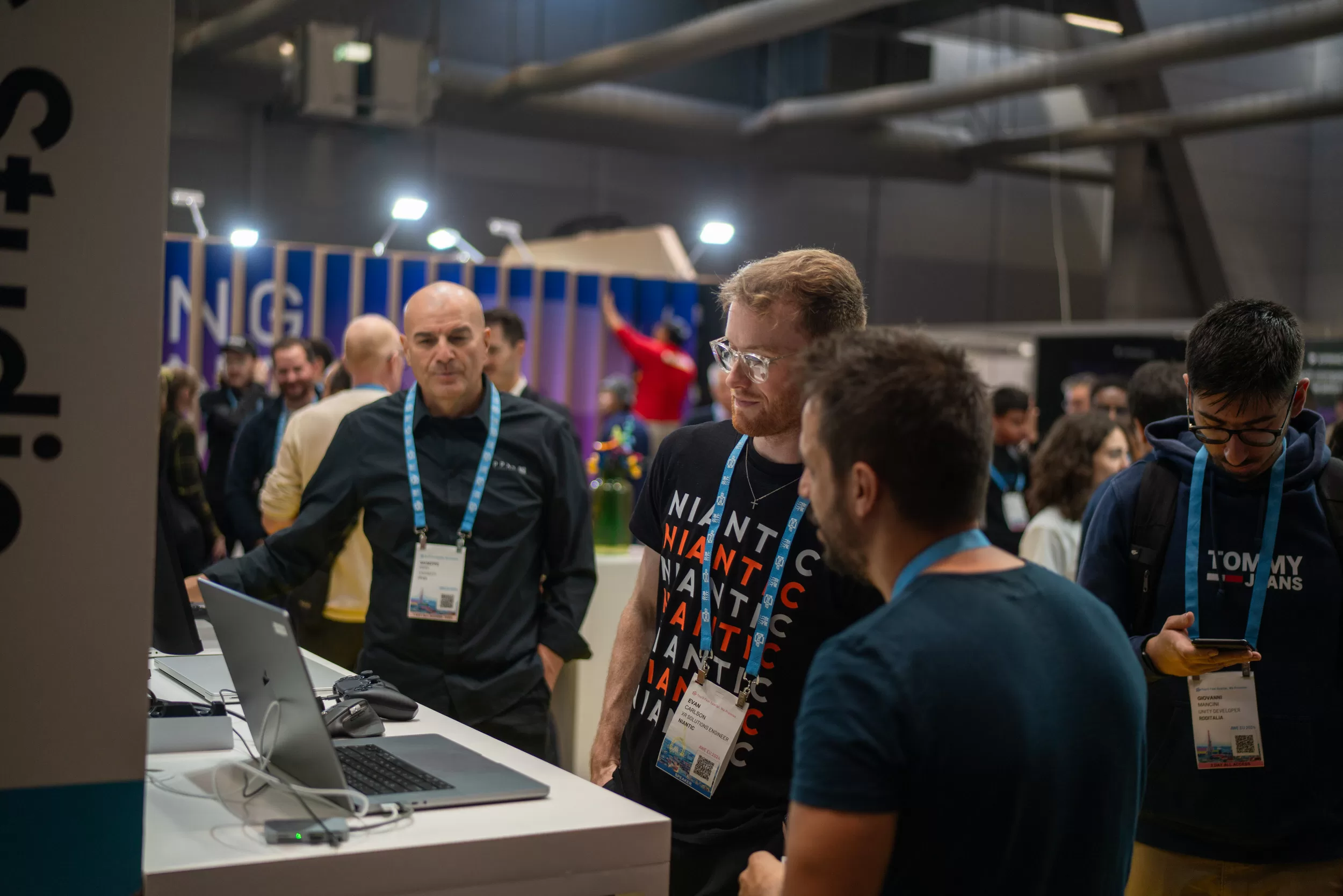 People networking at a tech expo