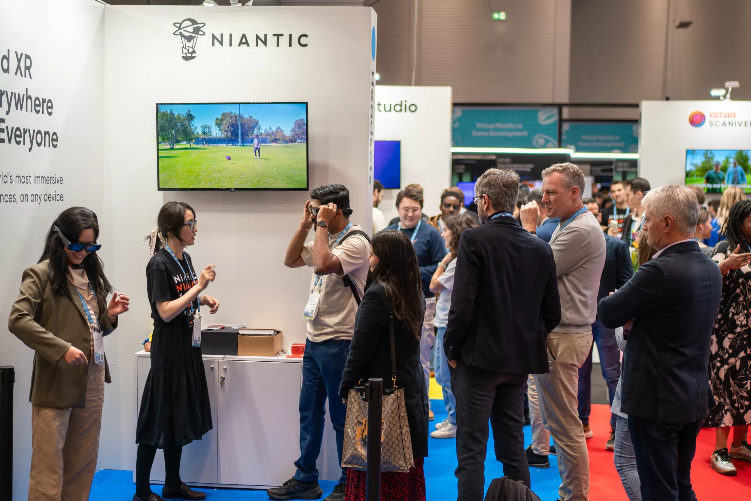 People queueing to try out a new product at an expo by photographer Fedor