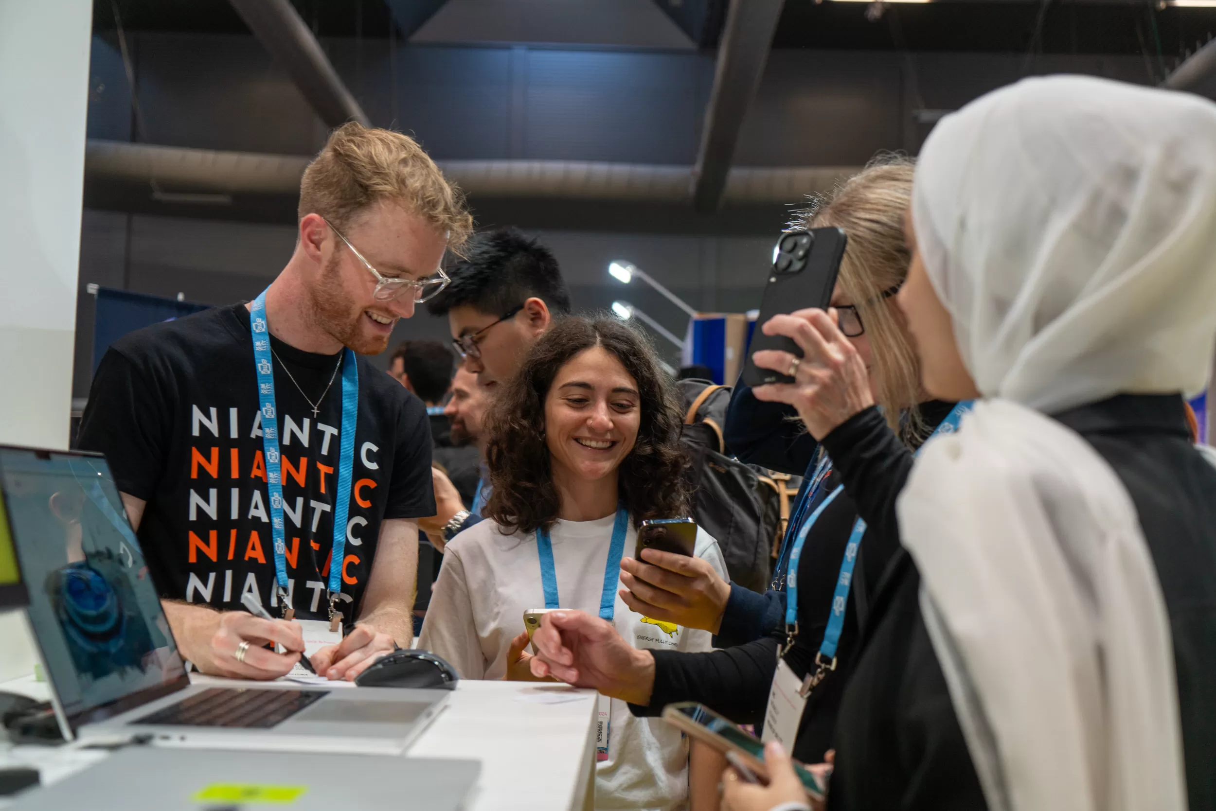 Berlin Trade Fair Photographer for Exhibitors & Brands Fedor Vasilev Photographer In Berlin Closeup people trying out new products at an expo