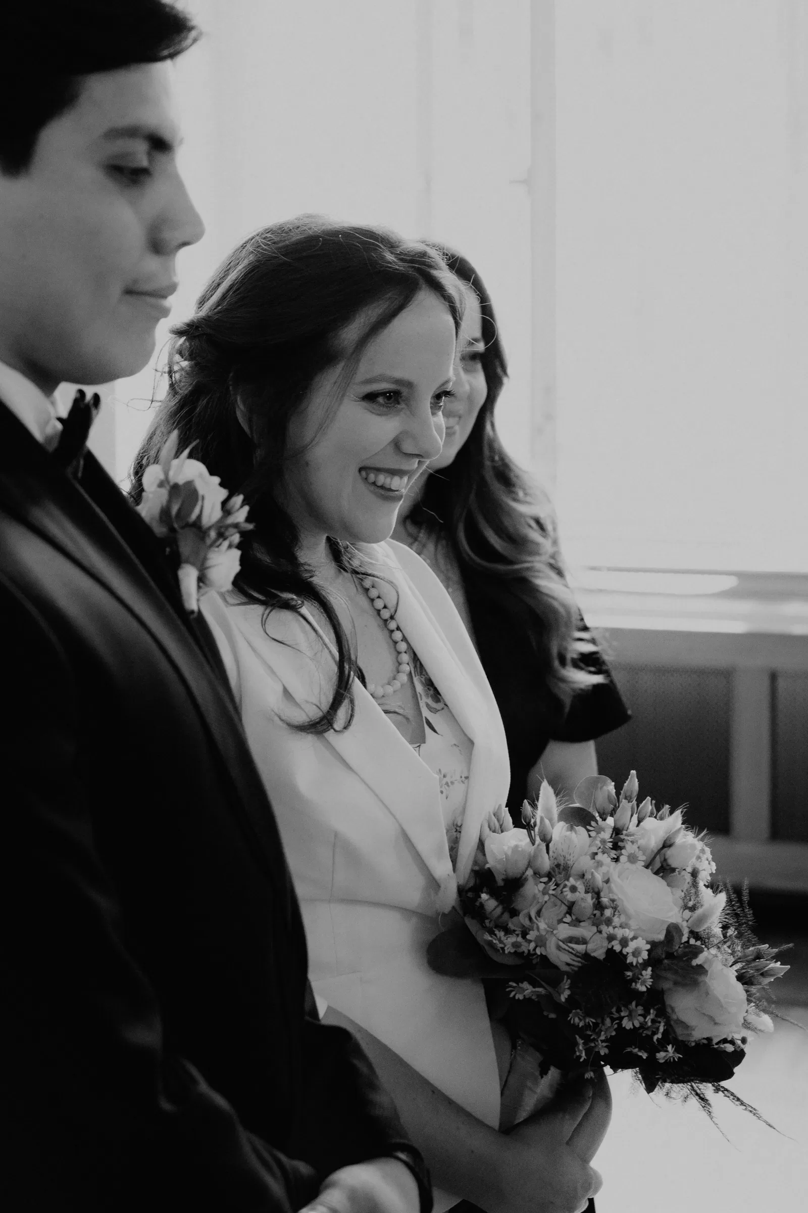 Black abd white photo of a couple on their wedding at a registry office