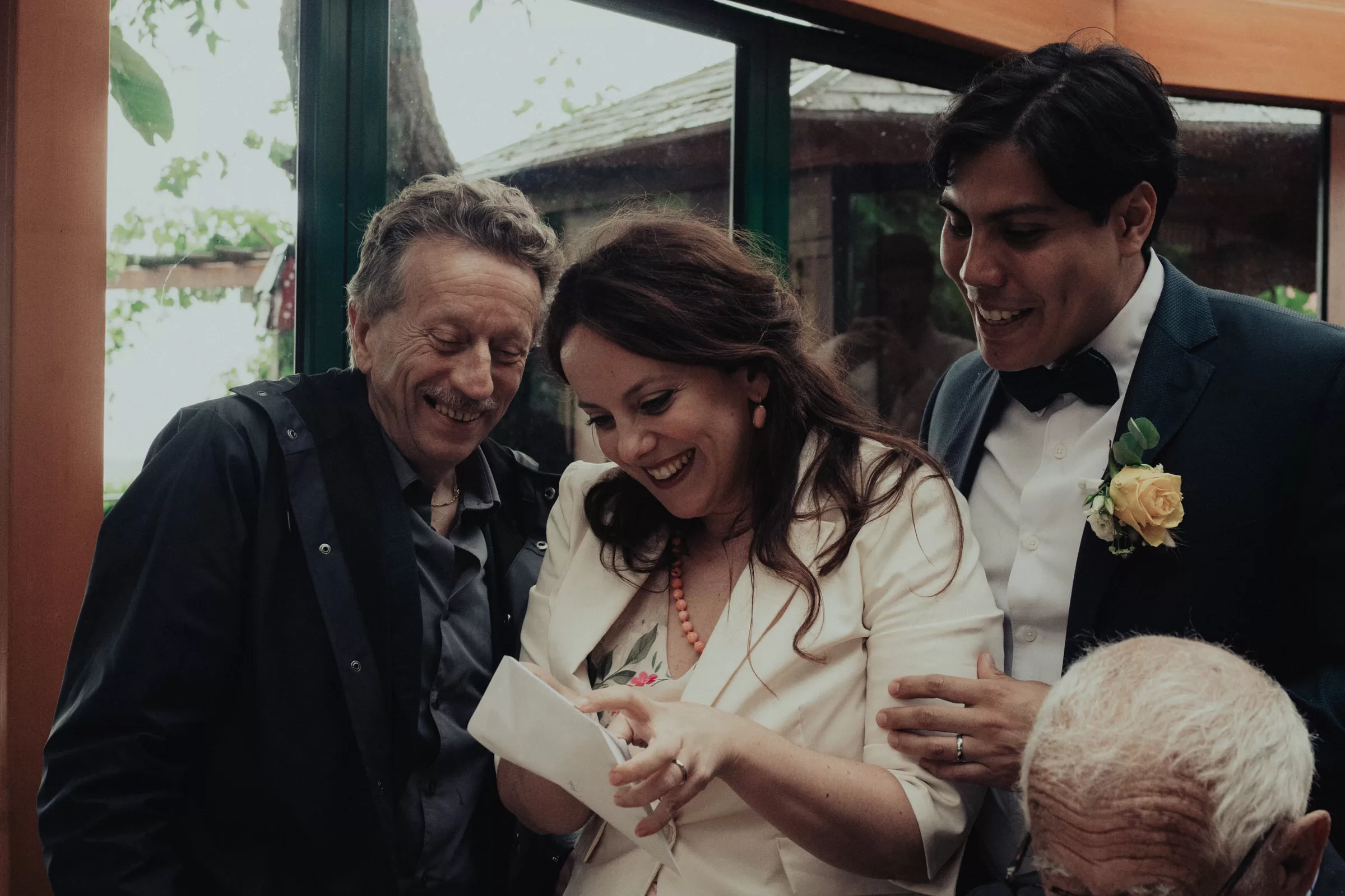 Guests exchange gifts with the couple on their wedding at heuriger