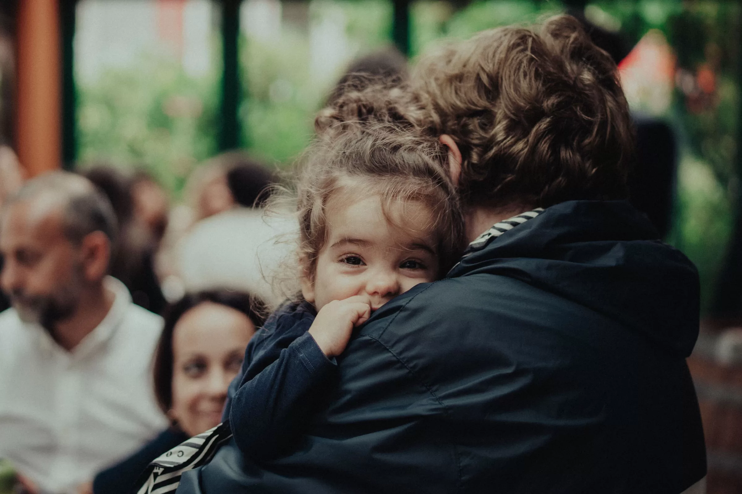 a child looking into the camera on a wedding in Vienna