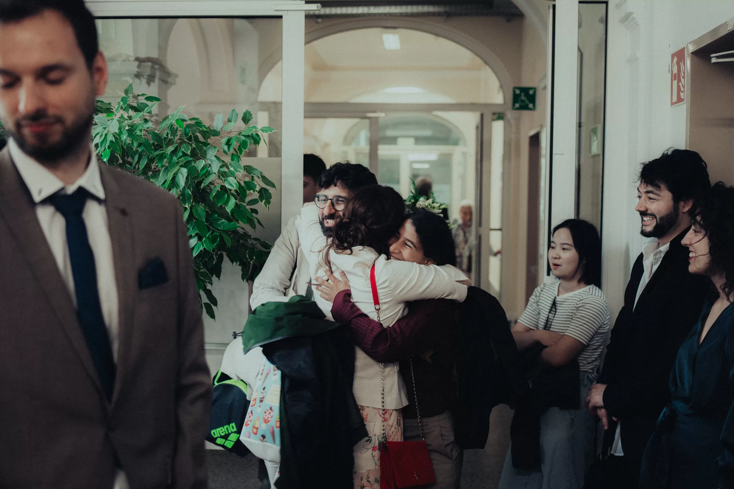 Guests arrive to a registry office in vienna for a wedding