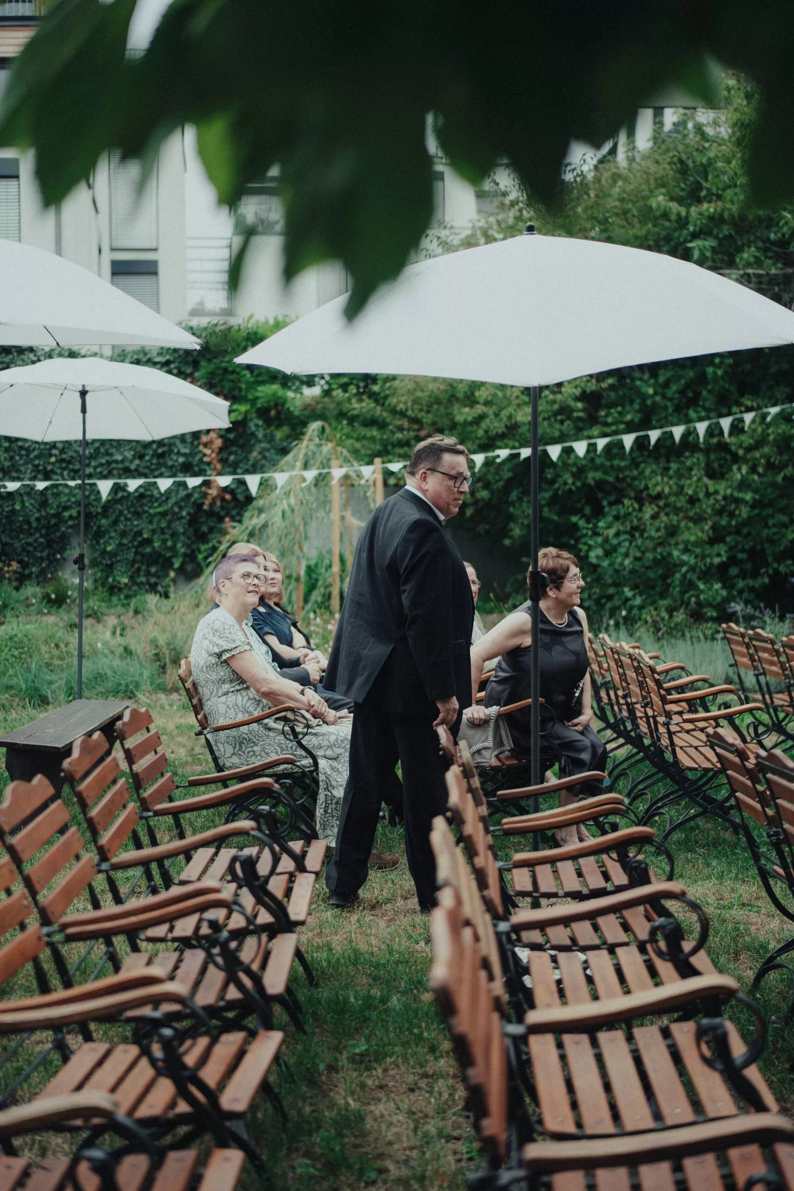 Guests arriving for a garden wedding
