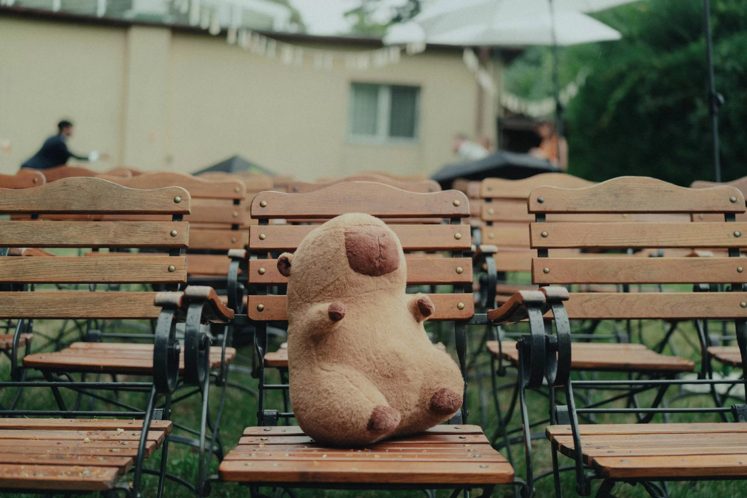 A plushy toy on a chair for a wedding ceremony