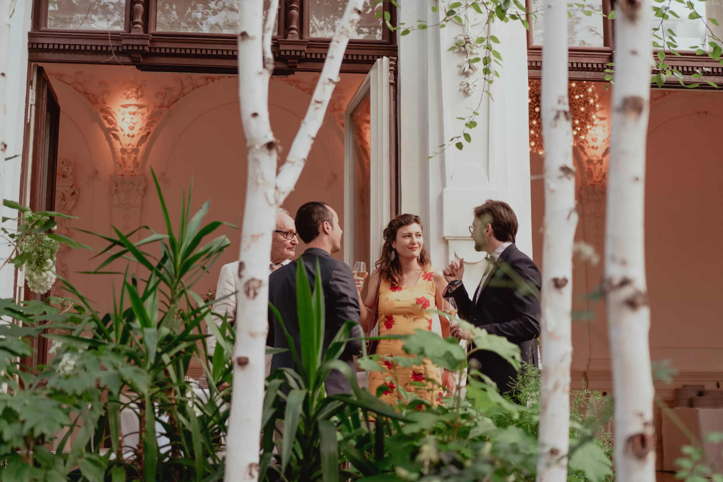 People celebrating a wedding at Vienna Ballhaus in the courtyard