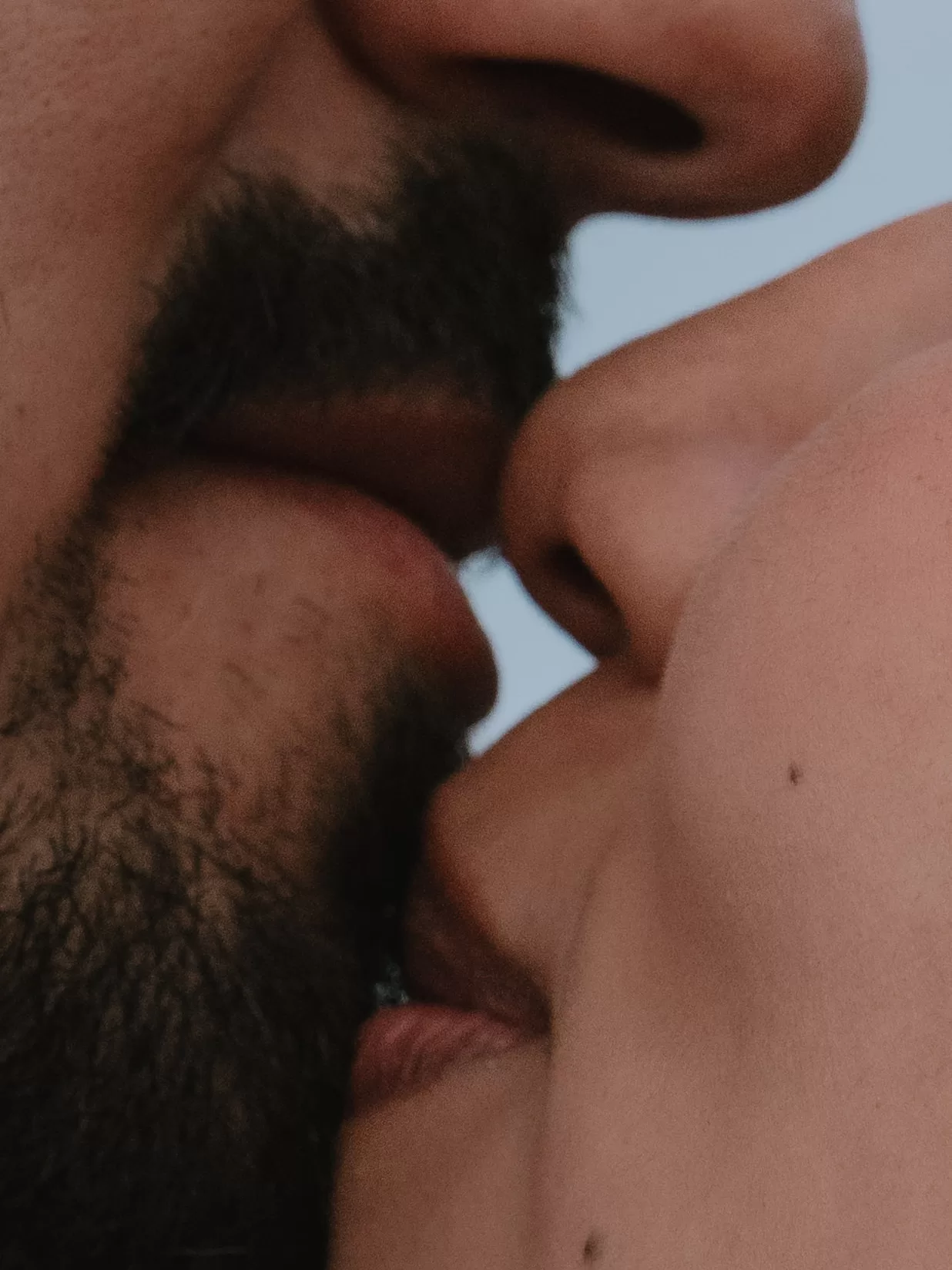 Couple having intimate moment almost kissing