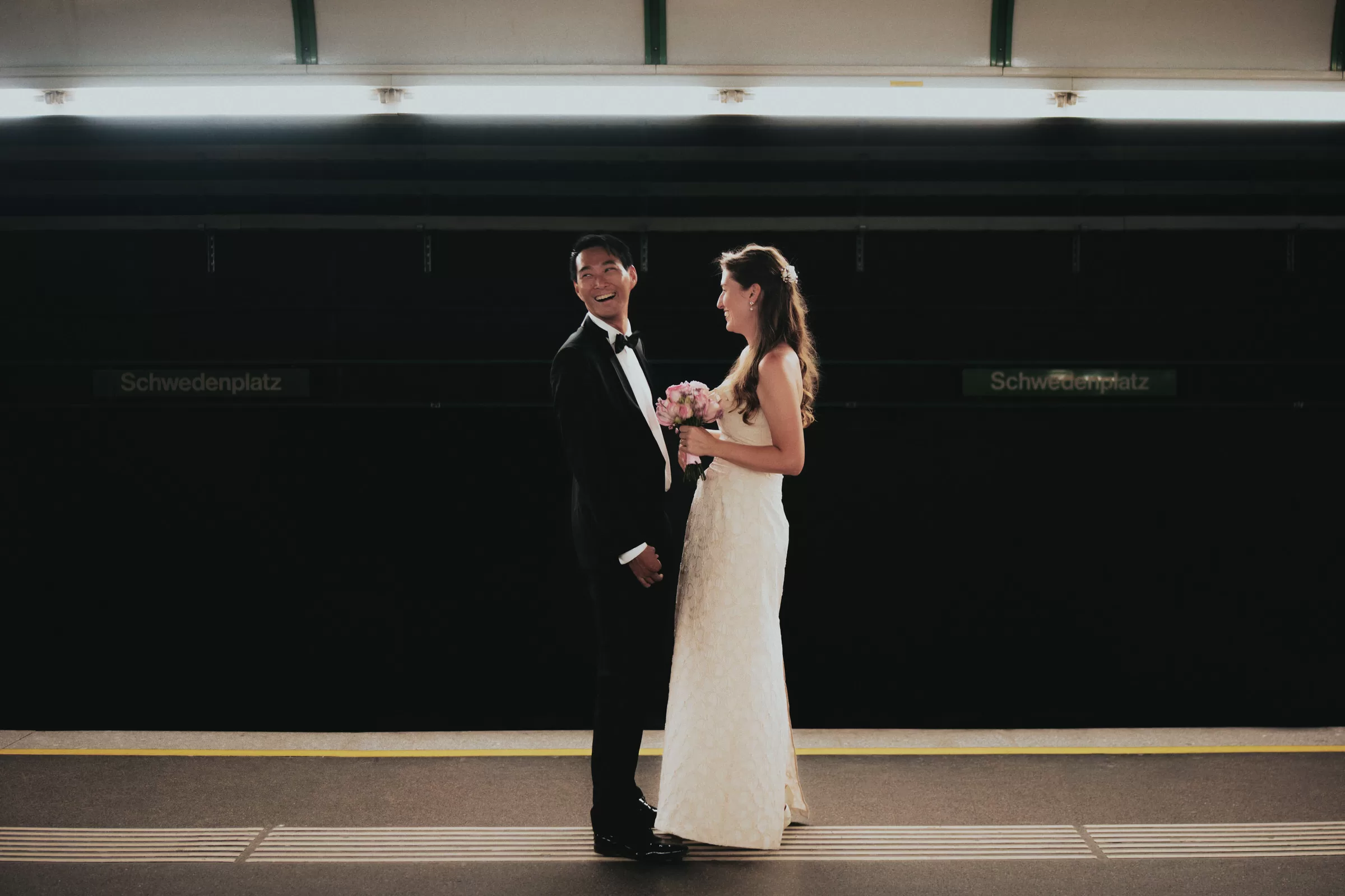 Couple hugging in an U-Bahn station in Vienna Schwedenplatz