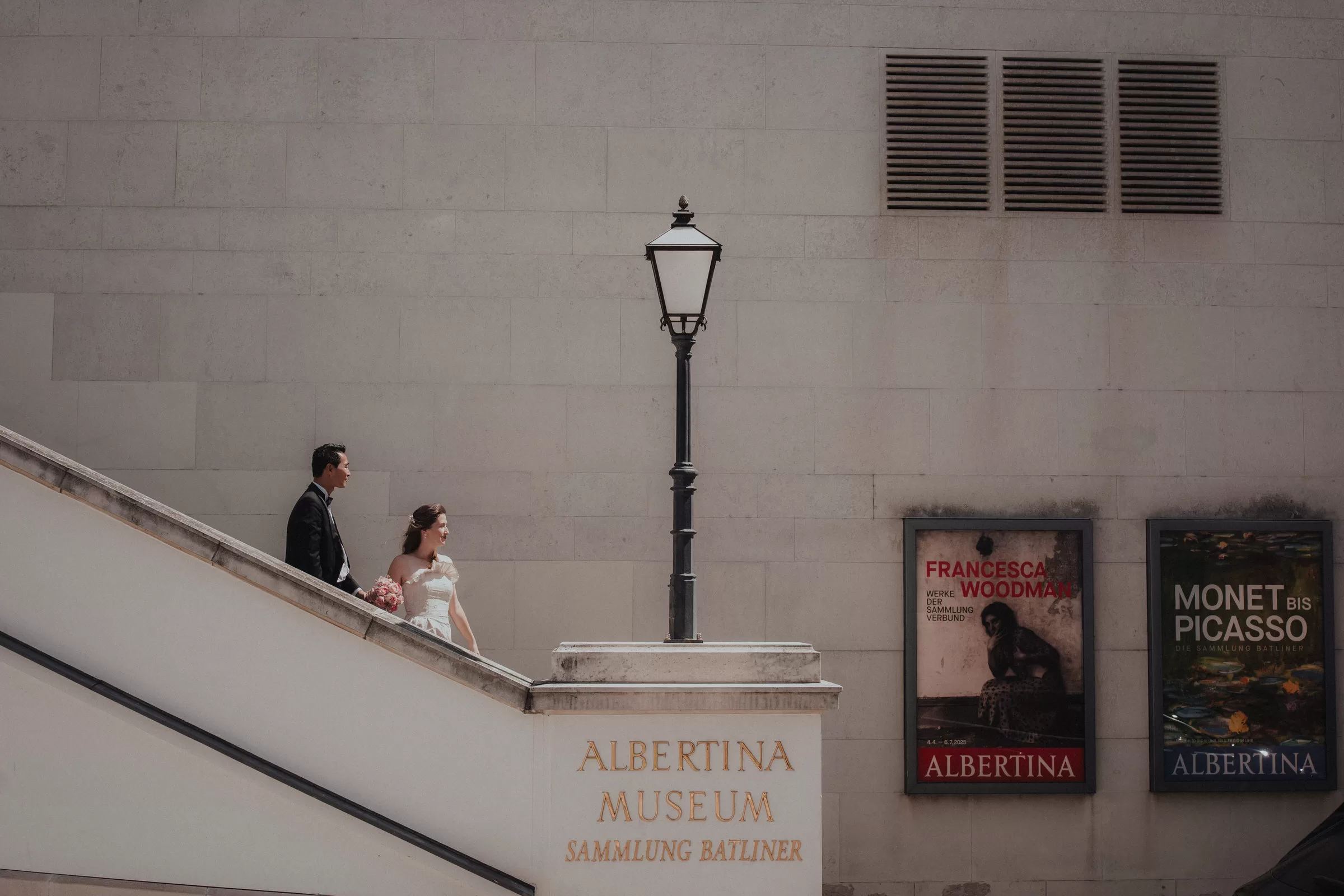 A couple going down the stairs of Albertina Terrace