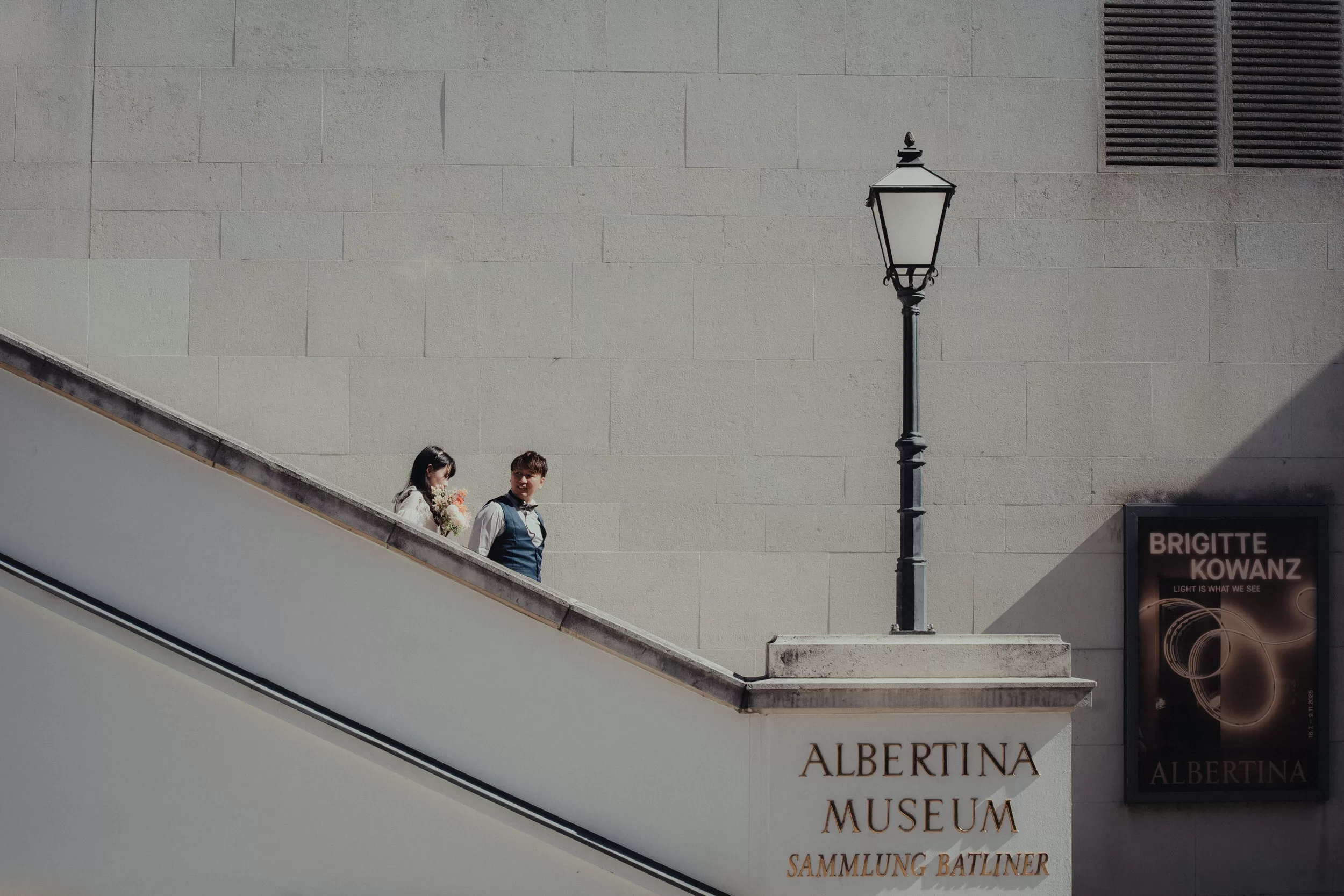 What cinematic photography means to me Fedor Vasilev Photographer In Berlin Closeup on a couple hugging and a woman holding hand around man's neck