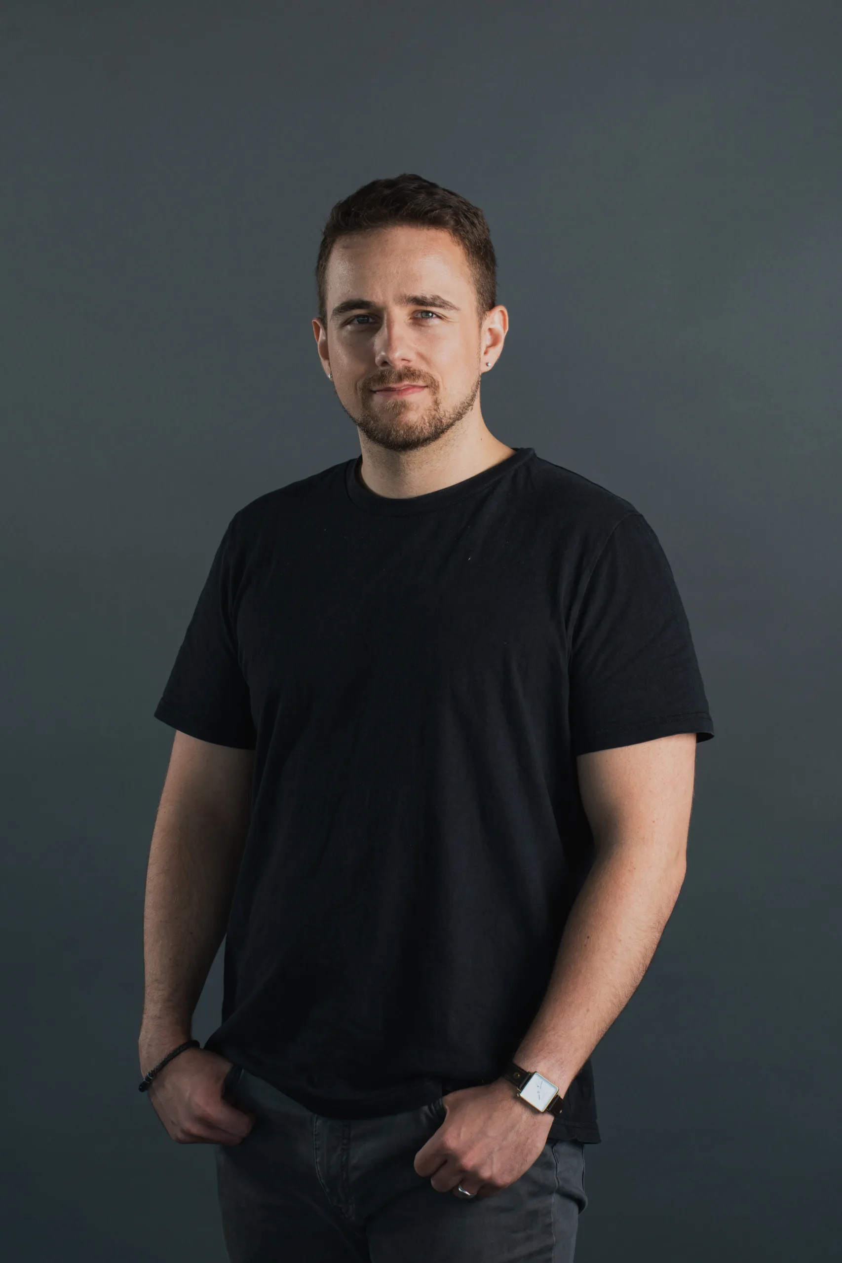 Business Portraits in Berlin Fedor Vasilev Photographer In Berlin Business portrait of a young professional in Berlin against a dark grey background
